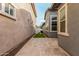 Backyard space with pavers, turf, and privacy fencing at 3868 E Robert St, Gilbert, AZ 85295