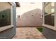Paver backyard with low maintenance synthetic grass at 3868 E Robert St, Gilbert, AZ 85295