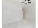This bedroom has neutral paint, plush carpet and a ceiling fan at 3868 E Robert St, Gilbert, AZ 85295