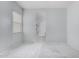 Carpeted bedroom leads to an ensuite bath with a glass door shower at 3868 E Robert St, Gilbert, AZ 85295