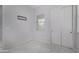 Bright bedroom with neutral walls, closet, and a window providing natural light at 3868 E Robert St, Gilbert, AZ 85295