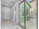 Inviting hallway leading to a courtyard with ample natural light at 3868 E Robert St, Gilbert, AZ 85295