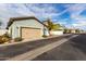 Neighborhood street view featuring multi-colored homes, garages, and sidewalks under a partly cloudy sky at 3868 E Robert St, Gilbert, AZ 85295