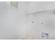 Small, empty utility room with tile flooring at 3868 E Robert St, Gilbert, AZ 85295