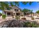 Beautiful backyard featuring low-maintenance landscaping, gazebo, and covered patio at 42735 W Bravo Dr, Maricopa, AZ 85138