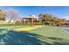 Community basketball court and playground featuring play structures, picnic benches and recreational opportunities at 42735 W Bravo Dr, Maricopa, AZ 85138