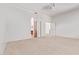 Spacious primary bedroom with neutral carpet and walk-in closet access at 42735 W Bravo Dr, Maricopa, AZ 85138