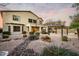 Home exterior with a stone walkway leading to a gazebo at 42735 W Bravo Dr, Maricopa, AZ 85138