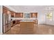 Bright kitchen with stainless appliances and center island at 42735 W Bravo Dr, Maricopa, AZ 85138