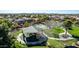 Community playground with covered picnic area, playground equipment, and mature landscaping at 42735 W Bravo Dr, Maricopa, AZ 85138