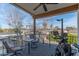Cozy balcony features seating and fitness equipment, with views of the neighborhood at 4306 E Flower St, Phoenix, AZ 85018