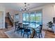 Elegant dining room with backyard view and access, with a staircase visible at 4306 E Flower St, Phoenix, AZ 85018