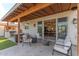 Inviting outdoor patio with comfortable seating, a built-in grill, and stylish decor at 4306 E Flower St, Phoenix, AZ 85018