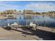 Pond view with seating area and a serene ambiance with waterfront views at 43486 W Mccord Dr, Maricopa, AZ 85138