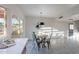 Dining area with tile floors, modern light fixture, and seating for four at 4731 N 26Th Ln, Phoenix, AZ 85017