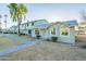 Charming exterior with light green siding, manicured bushes, and tidy landscaping at 4731 N 26Th Ln, Phoenix, AZ 85017