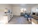 Bright living room featuring a large window, comfortable seating, and modern decor at 4731 N 26Th Ln, Phoenix, AZ 85017
