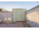Backyard shed for secure storage, built between cinderblock walls and easy access from brick path at 4731 N 26Th Ln, Phoenix, AZ 85017