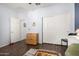 Bedroom featuring a comfortable sofa and additional storage at 5345 W Leodra Ln, Laveen, AZ 85339