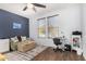 Office with comfortable sofa, desk, and ample natural light at 5345 W Leodra Ln, Laveen, AZ 85339
