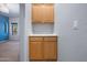Hallway with built in cabinets at 5422 W Bryce Ln, Glendale, AZ 85301