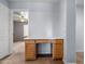 Home office space with a built-in desk at 5422 W Bryce Ln, Glendale, AZ 85301