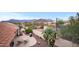 Enjoy mountain views from the backyard with a patio and desert landscaping at 6353 S Eagle Ct, Gold Canyon, AZ 85118