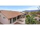Enjoy mountain views from the backyard with a patio and desert landscaping at 6353 S Eagle Ct, Gold Canyon, AZ 85118