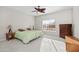 Bright bedroom with neutral walls, a large window, and two beds at 6353 S Eagle Ct, Gold Canyon, AZ 85118