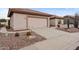 Charming home with desert landscaping and a two-car garage at 6353 S Eagle Ct, Gold Canyon, AZ 85118