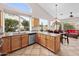 Bright kitchen with light wood cabinets, granite countertops, and stainless steel appliances at 6353 S Eagle Ct, Gold Canyon, AZ 85118