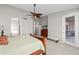 Spacious main bedroom with a ceiling fan, ensuite bathroom, walk-out to patio and neutral decor at 6353 S Eagle Ct, Gold Canyon, AZ 85118