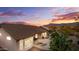 Private patio area featuring lounge chairs perfect for enjoying mountain views in a desert landscape at 6353 S Eagle Ct, Gold Canyon, AZ 85118