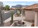 View of street featuring desert landscaping, tile roof and mountain views at 6353 S Eagle Ct, Gold Canyon, AZ 85118
