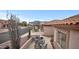 View of street featuring desert landscaping, tile roof and mountain views at 6353 S Eagle Ct, Gold Canyon, AZ 85118
