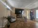 Bright living room features a fireplace, tile floor, and comfortable armchairs at 650 N Hawes Rd # 5445, Mesa, AZ 85207