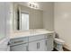 Tastefully designed powder room with a large mirror, modern vanity, and sleek fixtures at 6625 E Villa Rita Dr, Phoenix, AZ 85054