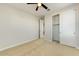 Bedroom features carpeted floors, closet, and neutral walls at 6625 E Villa Rita Dr, Phoenix, AZ 85054