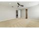 Spacious bedroom with a ceiling fan, neutral carpet, and recessed lighting at 6625 E Villa Rita Dr, Phoenix, AZ 85054