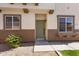 Home's front entrance with an olive green door and surrounding landscape, providing curb appeal at 681 E Los Arboles Pl, Chandler, AZ 85225