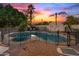 Fenced backyard pool and spa provide a secure and enjoyable outdoor space with desert landscaping at 7144 W Villa Chula --, Glendale, AZ 85310