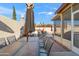 Outdoor dining area with grill provides an ideal space for entertaining in the backyard at 8736 W Kathleen Rd, Peoria, AZ 85382