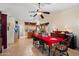 Open dining area with tile floors with lots of room for Gathering meals and entertaining guests near the kitchen at 8736 W Kathleen Rd, Peoria, AZ 85382