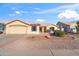 Single-story home featuring a well-maintained yard and neutral exterior, offering a comfortable and inviting curb appeal at 8736 W Kathleen Rd, Peoria, AZ 85382