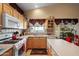Bright and airy kitchen with generous counter space, offering a practical and efficient layout for cooking and meal preparation at 8736 W Kathleen Rd, Peoria, AZ 85382