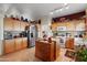 Functional kitchen featuring ample counter space, stainless steel appliances, and plenty of storage, ideal for cooking and meal prep at 8736 W Kathleen Rd, Peoria, AZ 85382