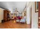 Open living room with hardwood floors, bright interiors, and stylish furnishings, perfect for entertaining and relaxing at 8736 W Kathleen Rd, Peoria, AZ 85382