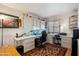Bright office space with built-in desk, cabinets, and a large window at 8736 W Kathleen Rd, Peoria, AZ 85382