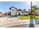 Charming two-story stucco home featuring a red tile roof, manicured lawn and circular driveway at 901 E Scott Ave, Gilbert, AZ 85234