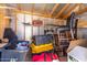 Inside a storage shed with packed materials on shelves at 901 E Scott Ave, Gilbert, AZ 85234